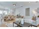 Spacious open-concept living room and dining area boasts hardwood floors and natural light at 316 11Th N Ave, St Petersburg, FL 33701