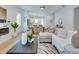 Bright living room showcases a modern fireplace, hardwood floors, and an open layout at 316 11Th N Ave, St Petersburg, FL 33701