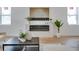 Modern living room features a contemporary fireplace, stylish decor, and hardwood floors at 316 11Th N Ave, St Petersburg, FL 33701