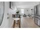 Bright living area with stainless steel appliances, hardwood floors, and cozy decor, offering a welcoming atmosphere at 316 11Th N Ave, St Petersburg, FL 33701