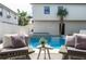 View of the beautiful pool and seating with lush landscaping creating a private oasis at 316 11Th N Ave, St Petersburg, FL 33701