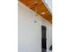 Outdoor shower with modern fixtures, wood ceiling, and dark trim, offering a refreshing experience in a stylish setting at 316 11Th N Ave, St Petersburg, FL 33701