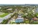 Gorgeous aerial of a two-story home, showcasing beautiful landscaping and a serene neighborhood at 4234 4Th S St, St Petersburg, FL 33705