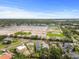 Serene aerial of a neighborhood showcasing a large lot and lush greenery at 4234 4Th S St, St Petersburg, FL 33705