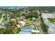 An aerial shot of a cozy neighborhood with homes surrounded by trees and green lawns at 4234 4Th S St, St Petersburg, FL 33705