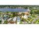 Stunning aerial view of a waterfront home with lush landscaping and a private dock at 4234 4Th S St, St Petersburg, FL 33705