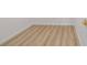 Close up of Bedroom with wood-look flooring and white trim at 4234 4Th S St, St Petersburg, FL 33705