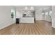 Spacious living room featuring a bar, natural light, and an open layout to the kitchen at 4234 4Th S St, St Petersburg, FL 33705