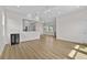 Bright and open floor plan with bar, natural light and wood-look flooring throughout at 4234 4Th S St, St Petersburg, FL 33705