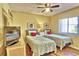 Guest bedroom with twin beds and colorful bedding at 7532 Bayshore Dr # 205, Treasure Island, FL 33706