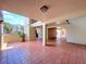 Open-air common area featuring tiled flooring and support columns at 7532 Bayshore Dr # 205, Treasure Island, FL 33706