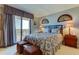 Bedroom with a comfortable bed and ocean view at 3820 Gulf Blvd # 608, St Pete Beach, FL 33706