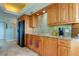 Bright kitchen with granite countertops and ample cabinet space at 3820 Gulf Blvd # 608, St Pete Beach, FL 33706