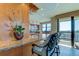 Granite breakfast bar with seating for two and stylish decor at 3820 Gulf Blvd # 608, St Pete Beach, FL 33706