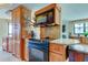 Modern kitchen with granite countertops and stainless steel appliances at 3820 Gulf Blvd # 608, St Pete Beach, FL 33706