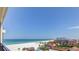 Stunning panoramic ocean view from condo balcony, showcasing beach and coastline at 3820 Gulf Blvd # 608, St Pete Beach, FL 33706