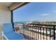 Relaxing balcony overlooking the beach with a comfortable lounge chair at 3820 Gulf Blvd # 608, St Pete Beach, FL 33706