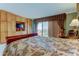 Spacious bedroom with built-in wooden cabinets and a view at 3820 Gulf Blvd # 608, St Pete Beach, FL 33706
