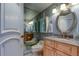 Updated bathroom with light blue walls, a large vanity, and a walk-in shower at 3820 Gulf Blvd # 608, St Pete Beach, FL 33706