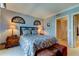 Serene bedroom with a view and decorative accents at 3820 Gulf Blvd # 608, St Pete Beach, FL 33706