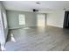 Bright living room featuring neutral walls and wide plank flooring at 1919 21St S St, St Petersburg, FL 33712