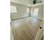 Bright bedroom with ceiling fan and two windows at 1919 21St S St, St Petersburg, FL 33712