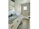 Modern bathroom with granite countertop vanity and patterned tile at 1919 21St S St, St Petersburg, FL 33712