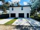 Two-story house with a two-car garage and concrete driveway at 1919 21St S St, St Petersburg, FL 33712