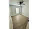 Bright bedroom with ceiling fan and vinyl plank flooring at 1919 21St S St, St Petersburg, FL 33712