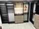 Spacious walk-in closet with custom organizers, sleek shelving, and drawers for efficient storage, enhancing functionality at 4438 58Th N Ave, St Petersburg, FL 33714