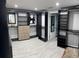 Organized walk-in closet with custom shelving, drawers, and a full-length mirror, offering ample storage space at 4438 58Th N Ave, St Petersburg, FL 33714