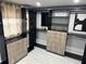 Spacious walk-in closet with custom organizers, sleek shelving, and drawers for efficient storage, enhancing functionality at 4438 58Th N Ave, St Petersburg, FL 33714