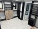Organized walk-in closet with custom shelving, drawers, and a full-length mirror, offering ample storage space at 4438 58Th N Ave, St Petersburg, FL 33714