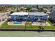 This waterfront duplex features a shared in-ground pool and backyard at 800 Madonna Blvd # B, Tierra Verde, FL 33715