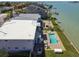This waterfront duplex features a shared in-ground pool and backyard at 800 Madonna Blvd # B, Tierra Verde, FL 33715