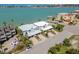 Waterfront home featuring carports, lush landscaping and gorgeous water views at 800 Madonna Blvd # B, Tierra Verde, FL 33715