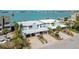 Waterfront home featuring carports, lush landscaping and gorgeous water views at 800 Madonna Blvd # B, Tierra Verde, FL 33715