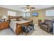 Spacious bedroom with a king-size bed, and a ceiling fan at 800 Madonna Blvd # B, Tierra Verde, FL 33715