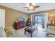 Living room with water view and access to balcony at 800 Madonna Blvd # B, Tierra Verde, FL 33715