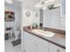 Clean bathroom with single sink vanity, toilet and shower at 800 Madonna Blvd # B, Tierra Verde, FL 33715