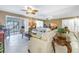 Living room with water views and large mirror at 800 Madonna Blvd # B, Tierra Verde, FL 33715
