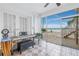 Sunroom features water views and access to patio at 800 Madonna Blvd # B, Tierra Verde, FL 33715