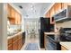 Bright kitchen with stainless steel appliances and breakfast nook at 10823 Indian Hills Ct # 33, Seminole, FL 33777