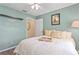 Bright bedroom with a comfortable bed and en-suite bathroom access at 10823 Indian Hills Ct # 33, Seminole, FL 33777
