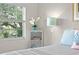 Bedroom with a charming window and soft color scheme at 10823 Indian Hills Ct # 33, Seminole, FL 33777