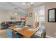 Dining area with table and chairs, open to living and kitchen areas at 10823 Indian Hills Ct # 33, Seminole, FL 33777
