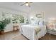 Main bedroom with vaulted ceilings and a ceiling fan at 10823 Indian Hills Ct # 33, Seminole, FL 33777