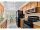 Modern kitchen with stainless steel appliances and breakfast nook at 10823 Indian Hills Ct # 33, Seminole, FL 33777