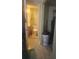 View of bathroom and closet from hallway at 7505 Pitch Pine Cir # 123, Tampa, FL 33617