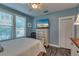 Bedroom with queen bed, dresser, and closet at 18 Heilwood St, Clearwater Beach, FL 33767